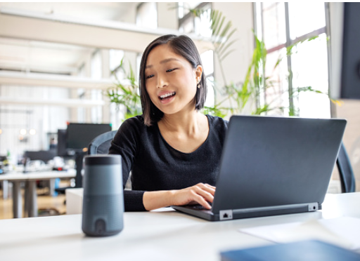 Woman talking to Alexa